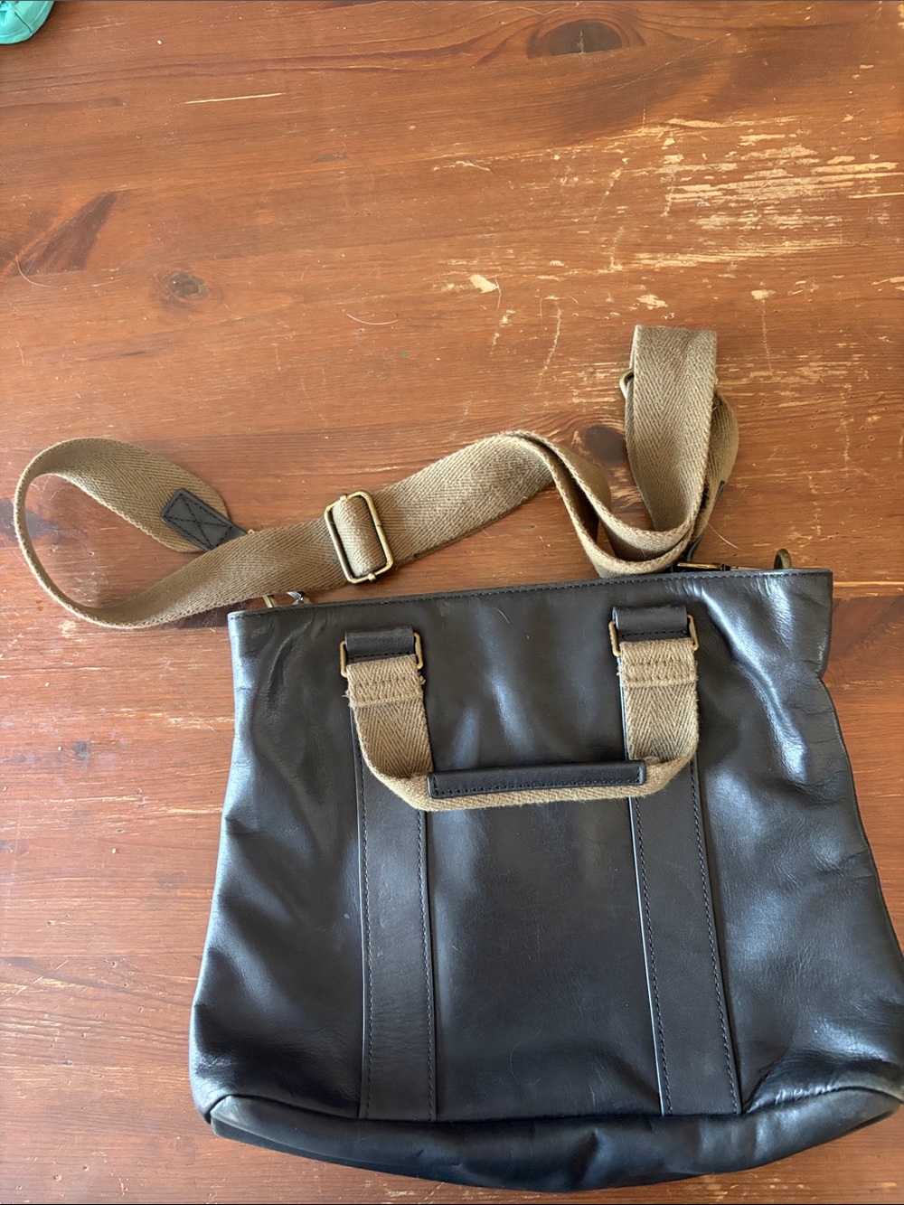 FEED Black Leather Messenger Bag with Brown Strap Web Adjustable Strap